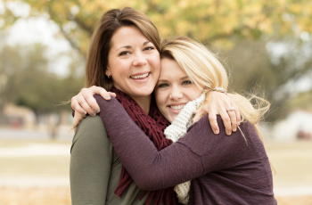 two girls hugging