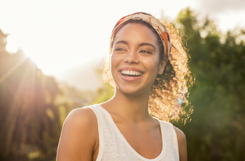 Girl smiling in the sun